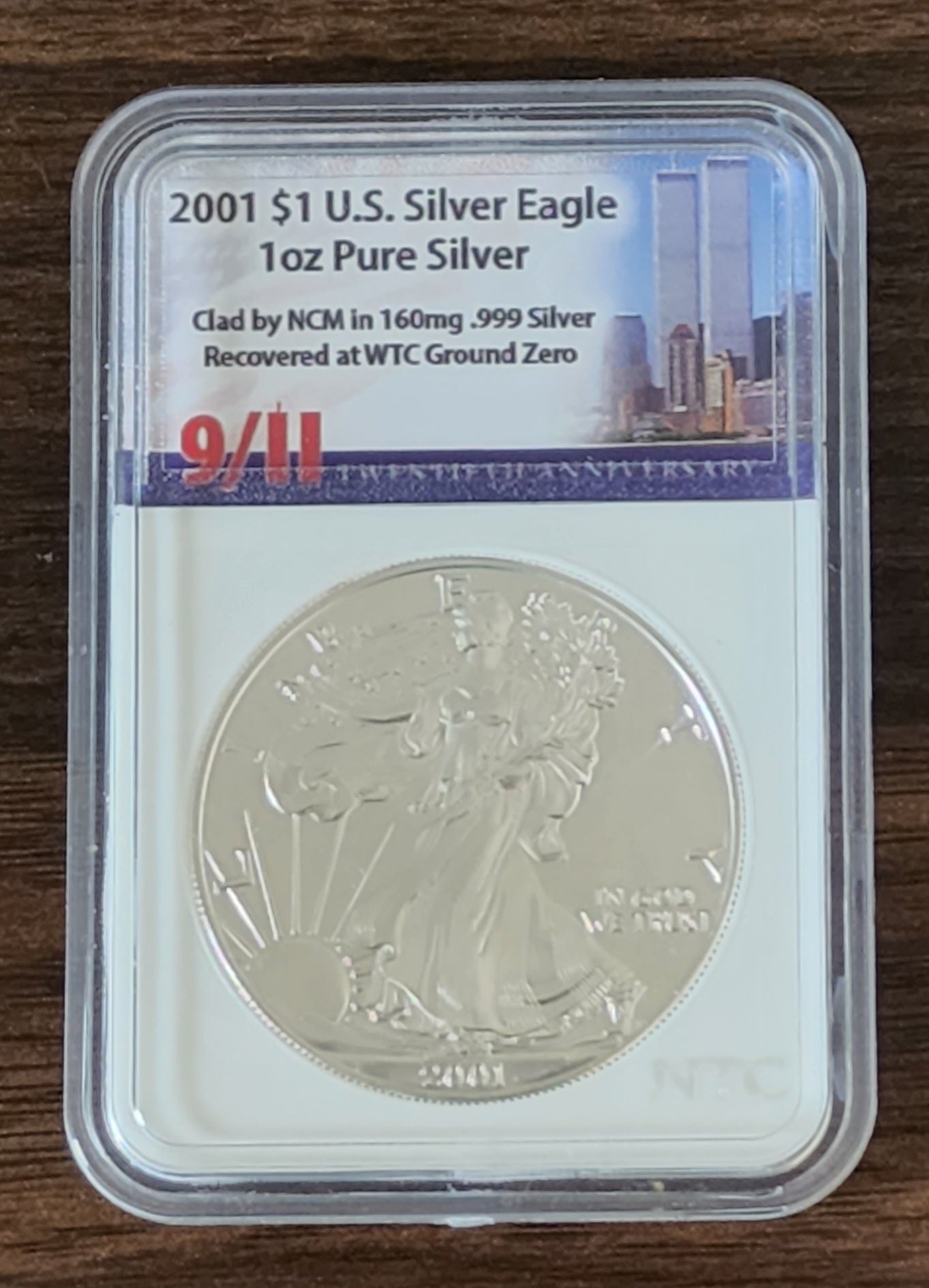 2001 Silver Eagle Dollar 1ozt .999 WTC 9/11 Ground Zero Recovery Clad NTC Certified